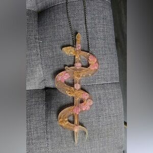 Pink Floral Snake & Dagger Resin Wall Hanging